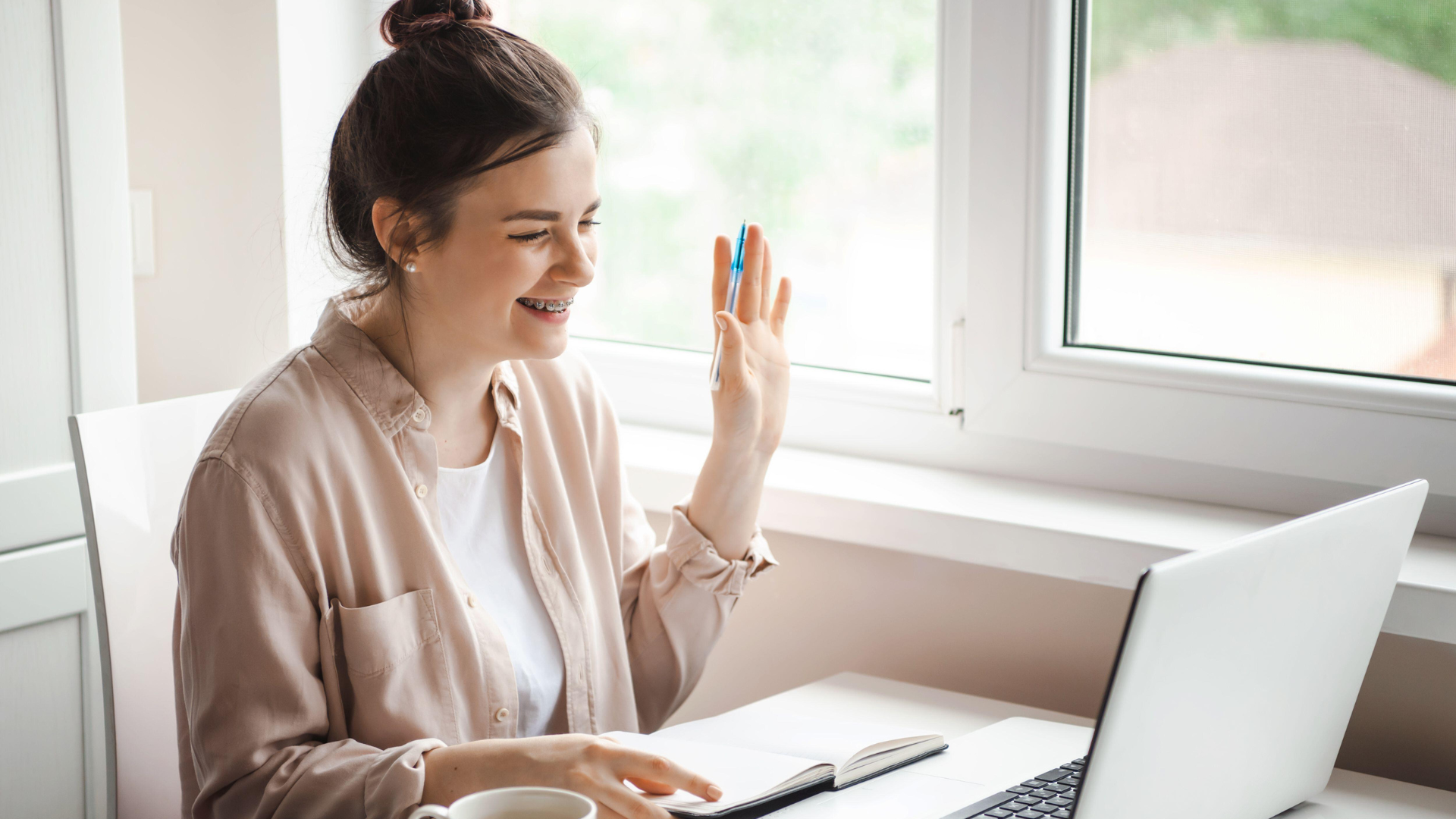 Woman having an online English conversation via video call